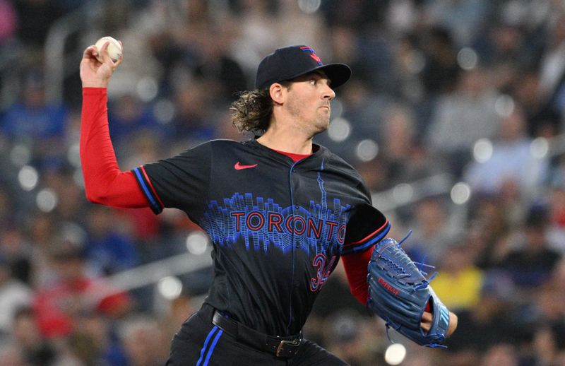 Sep 25, 2024; Toronto, Ontario, CAN;  Toronto Blue Jays starting pitcher Kevin Gausman (34) delivers a pitch against the Boston Red Sox in the first inning at Rogers Centre. Mandatory Credit: Dan Hamilton-Imagn Images