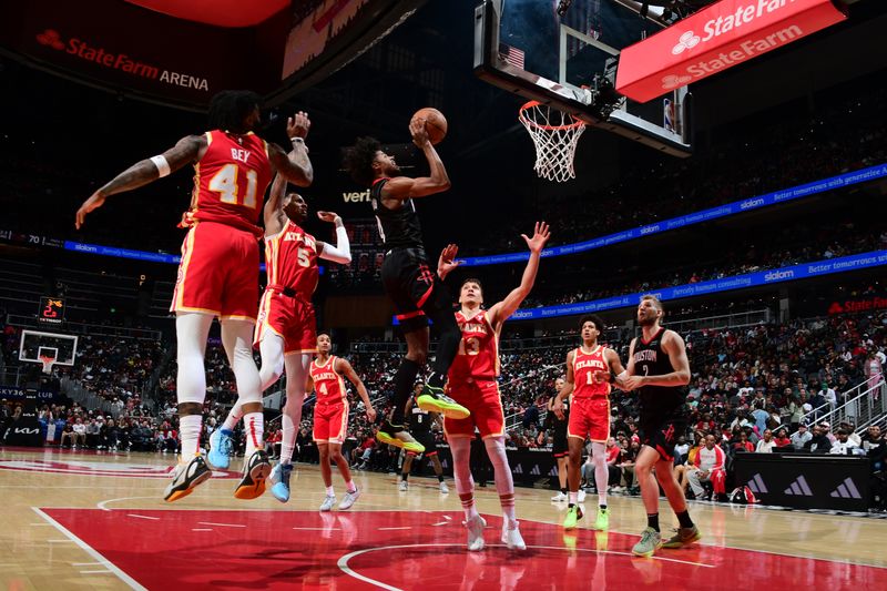 ATLANTA, GA - FEBRUARY 10: Jalen Green #4 of the Houston Rockets drives to the basket during the game against the Atlanta Hawks on February 10, 2024 at State Farm Arena in Atlanta, Georgia.  NOTE TO USER: User expressly acknowledges and agrees that, by downloading and/or using this Photograph, user is consenting to the terms and conditions of the Getty Images License Agreement. Mandatory Copyright Notice: Copyright 2024 NBAE (Photo by Scott Cunningham/NBAE via Getty Images)