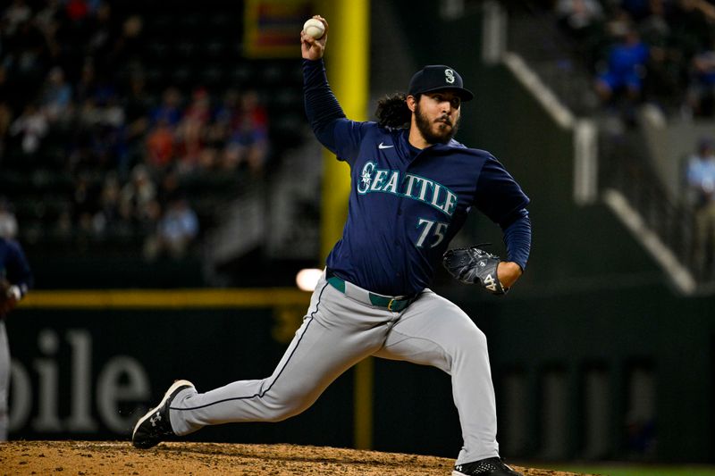 Apr 23, 2024; Arlington, Texas, USA; Seattle Mariners relief pitcher Andres Munoz (75) pitches against the Texas Rangers during the game at Globe Life Field. Mandatory Credit: Jerome Miron-USA TODAY Sports