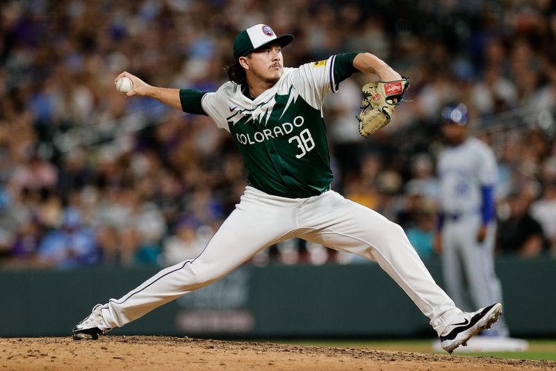 Jul 6, 2024; Denver, Colorado, USA; Colorado Rockies relief pitcher Victor Vodnik (38) pitches in the ninth inning against the Kansas City Royals at Coors Field. Mandatory Credit: Isaiah J. Downing-USA TODAY Sports