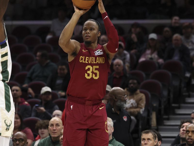 CLEVELAND, OH - NOVEMBER 4:  Isaac Okoro #35 of the Cleveland Cavaliers shoots the ball during the game against the Milwaukee Bucks on November 4, 2024 at Rocket Mortgage FieldHouse in Cleveland, Ohio. NOTE TO USER: User expressly acknowledges and agrees that, by downloading and/or using this Photograph, user is consenting to the terms and conditions of the Getty Images License Agreement. Mandatory Copyright Notice: Copyright 2024 NBAE (Photo by  Lauren Leigh Bacho/NBAE via Getty Images)