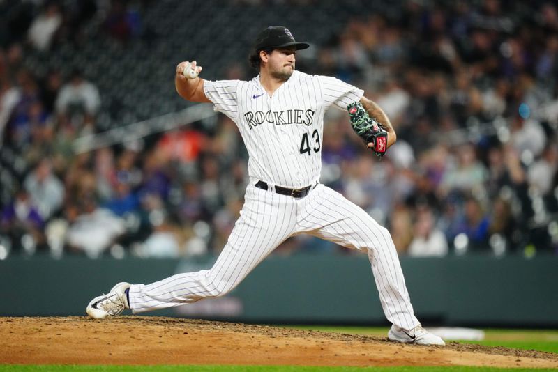 Sep 28, 2023; Denver, Colorado, USA; Colorado Rockies relief pitcher Connor Seabold (43) delivers a pitch in the ninth inning against the Los Angeles Dodgers at Coors Field. Mandatory Credit: Ron Chenoy-USA TODAY Sports