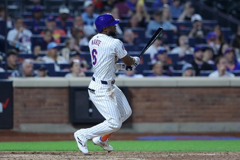 Jun 13, 2024; New York City, New York, USA; New York Mets right fielder Starling Marte (6) follows through on a run scoring bases loaded double play ground ball during the seventh inning against the Miami Marlins at Citi Field. Mandatory Credit: Brad Penner-USA TODAY Sports