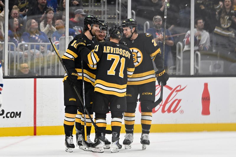 Oct 4, 2025; Boston, Massachusetts, USA; Boston Bruins center Pavel Zacha (18) (l) celebrates a goal against the New York Rangers with teammates during the first period at TD Garden. Mandatory Credit: Eric Canha-Imagn Images
