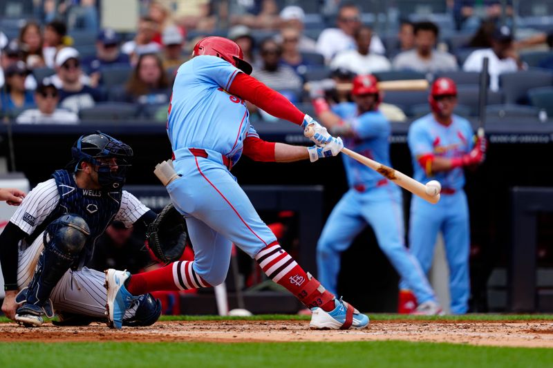 Aug 31, 2024; Bronx, New York, USA; St. Louis Cardinals second baseman Brendan Donovan (33) hits a three run home run against the New York Yankees during the third inning at Yankee Stadium. Mandatory Credit: Gregory Fisher-USA TODAY Sports