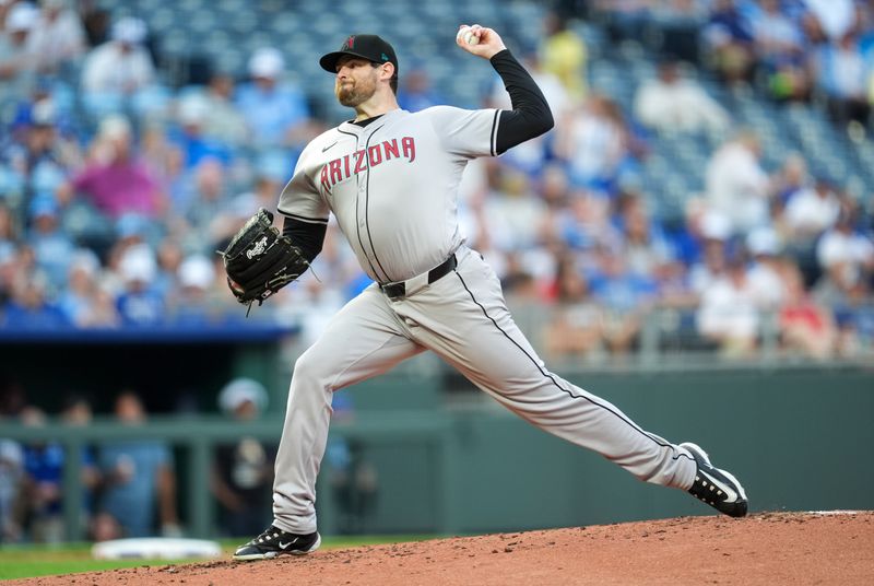 Jul 23, 2024; Kansas City, Missouri, USA; Arizona Diamondbacks starting pitcher Jordan Montgomery (52) pitches during the first inning against the Kansas City Royals at Kauffman Stadium. Mandatory Credit: Jay Biggerstaff-USA TODAY Sports