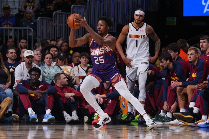 DENVER, CO - OCTOBER 13: Mamadi Diakite #25 of the Phoenix Suns handles the ball during the game against the Denver Nuggets on October 13, 2024 at Ball Arena in Denver, Colorado. NOTE TO USER: User expressly acknowledges and agrees that, by downloading and/or using this Photograph, user is consenting to the terms and conditions of the Getty Images License Agreement. Mandatory Copyright Notice: Copyright 2024 NBAE (Photo by Bart Young/NBAE via Getty Images)