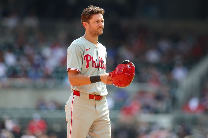 Jul 7, 2024; Atlanta, Georgia, USA; Philadelphia Phillies shortstop Trea Turner (7) in the field against the Atlanta Braves in the eighth inning at Truist Park. Mandatory Credit: Brett Davis-USA TODAY Sports