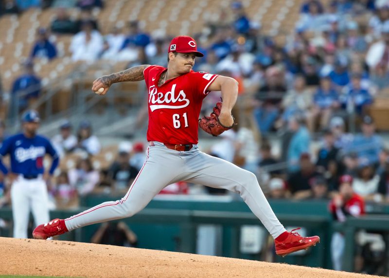 Mar 4, 2025; Phoenix, Arizona, USA; Cincinnati Reds pitcher Chase Petty against the Los Angeles Dodgers during a spring training game at Camelback Ranch-Glendale. Mandatory Credit: Mark J. Rebilas-Imagn Images