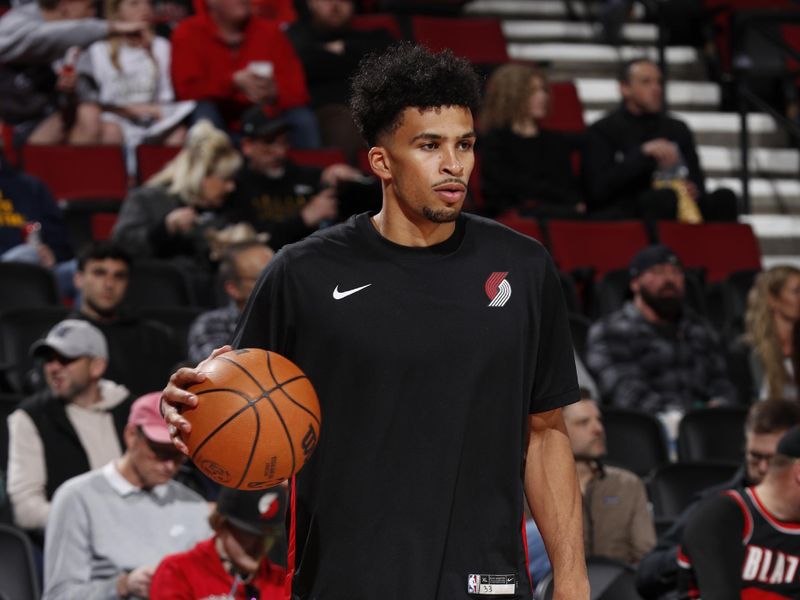 PORTLAND, OR - MARCH 23: Toumani Camara #33 of the Portland Trail Blazers warms up before the game against the Denver Nuggets on March 23, 2024 at the Moda Center Arena in Portland, Oregon. NOTE TO USER: User expressly acknowledges and agrees that, by downloading and or using this photograph, user is consenting to the terms and conditions of the Getty Images License Agreement. Mandatory Copyright Notice: Copyright 2024 NBAE (Photo by Cameron Browne/NBAE via Getty Images)