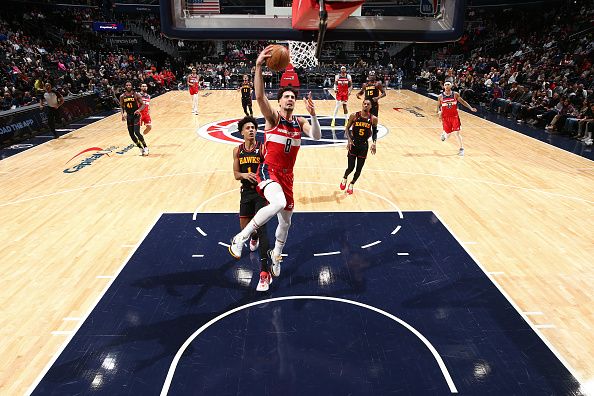 WASHINGTON, DC -? DECEMBER 31:Deni Avdija #8 of the Washington Wizards shoots the ball during the game against the Atlanta Hawks  on December 31, 2023 at Capital One Arena in Washington, DC. NOTE TO USER: User expressly acknowledges and agrees that, by downloading and or using this Photograph, user is consenting to the terms and conditions of the Getty Images License Agreement. Mandatory Copyright Notice: Copyright 2023 NBAE (Photo by Kenny Giarla/NBAE via Getty Images)