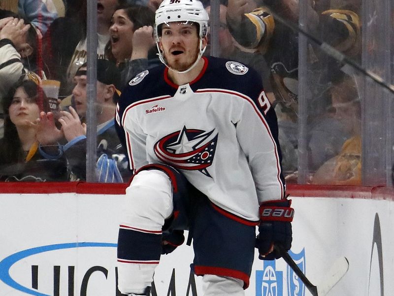 Mar 5, 2024; Pittsburgh, Pennsylvania, USA; Columbus Blue Jackets center Jack Roslovic (96) reacts after scoring a goal against the Pittsburgh Penguins during the third period at PPG Paints Arena. The Penguins won 5-3. Mandatory Credit: Charles LeClaire-USA TODAY Sports