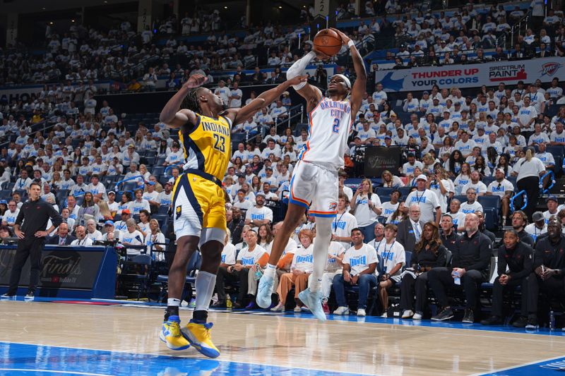 OKLAHOMA CITY, OK - JUNE 5:  Shai Gilgeous-Alexander #2 of the Oklahoma City Thunder shoots the ball during the game against the Indiana Pacers during Game One of the 2025 NBA Finals on June 5, 2025 at Paycom Center in Oklahoma City, Oklahoma. NOTE TO USER: User expressly acknowledges and agrees that, by downloading and or using this photograph, User is consenting to the terms and conditions of the Getty Images License Agreement. Mandatory Copyright Notice: Copyright 2025 NBAE (Photo by Jesse D. Garrabrant/NBAE via Getty Images)