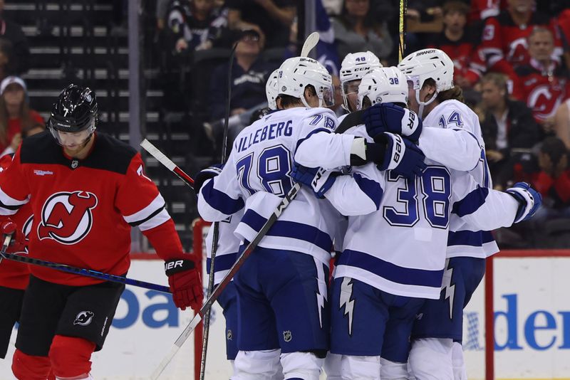 Oct 22, 2024; Newark, New Jersey, USA; Tampa Bay Lightning left wing Brandon Hagel (38) celebrates his goal against the New Jersey Devils during the second period at Prudential Center. Mandatory Credit: Ed Mulholland-Imagn Images