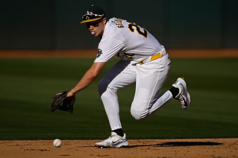 Sep 2, 2024; Oakland, California, USA; Oakland Athletics second base Zack Gelof (20) collects a ground ball hit by the Seattle Mariners in the sixth inning at Oakland-Alameda County Coliseum. Mandatory Credit: Eakin Howard-USA TODAY Sports