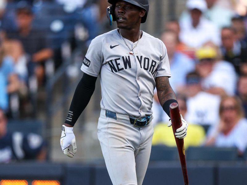 Apr 19, 2025; Tampa, Florida, USA; New York Yankees second baseman Jazz Chisholm Jr. (13) reacts after striking out against the Tampa Bay Rays in the fifth inning  at George M. Steinbrenner Field. Mandatory Credit: Nathan Ray Seebeck-Imagn Images