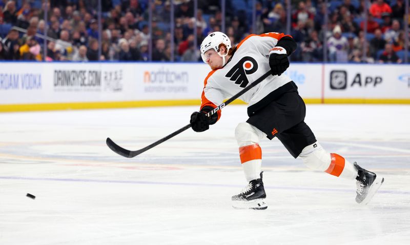 Apr 5, 2024; Buffalo, New York, USA;  Philadelphia Flyers right wing Owen Tippett (74) takes a shot on goal and scores during the third period against the Buffalo Sabres at KeyBank Center. Mandatory Credit: Timothy T. Ludwig-USA TODAY Sports