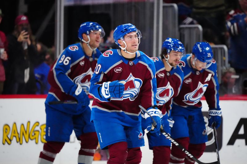 Oct 18, 2024; Denver, Colorado, USA; Colorado Avalanche center Ross Colton (20) celebrates his third period goal against the Anaheim Ducks at Ball Arena. Mandatory Credit: Ron Chenoy-Imagn Images