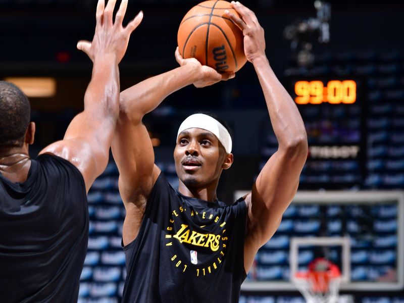 MINNEAPOLIS, MN -  APRIL 27: Christian Koloko #10 of the Los Angeles Lakers warms up before the game against the Minnesota Timberwolves during Round 1 Game 4 of the 2025 NBA Playoffs on April 27, 2025 at Target Center in Minneapolis, Minnesota. NOTE TO USER: User expressly acknowledges and agrees that, by downloading and or using this Photograph, user is consenting to the terms and conditions of the Getty Images License Agreement. Mandatory Copyright Notice: Copyright 2025 NBAE (Photo by Barry Gossage/NBAE via Getty Images)