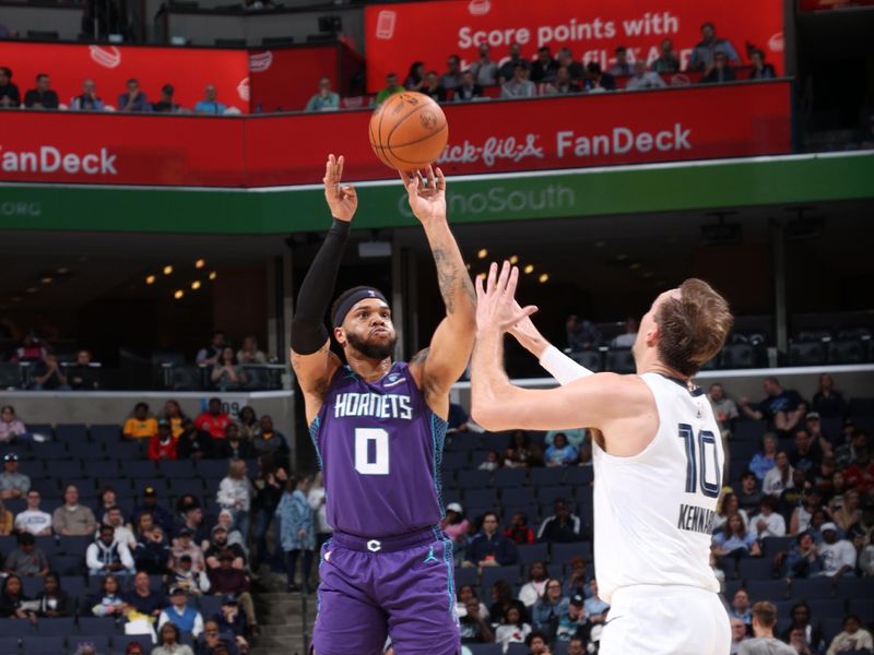 MEMPHIS, TN - MARCH 13:  Miles Bridges #0 of the Charlotte Hornets shoots a three point basket against the Memphis Grizzlies on March 13, 2024 at FedExForum in Memphis, Tennessee. NOTE TO USER: User expressly acknowledges and agrees that, by downloading and or using this photograph, User is consenting to the terms and conditions of the Getty Images License Agreement. Mandatory Copyright Notice: Copyright 2024 NBAE (Photo by Joe Murphy/NBAE via Getty Images)