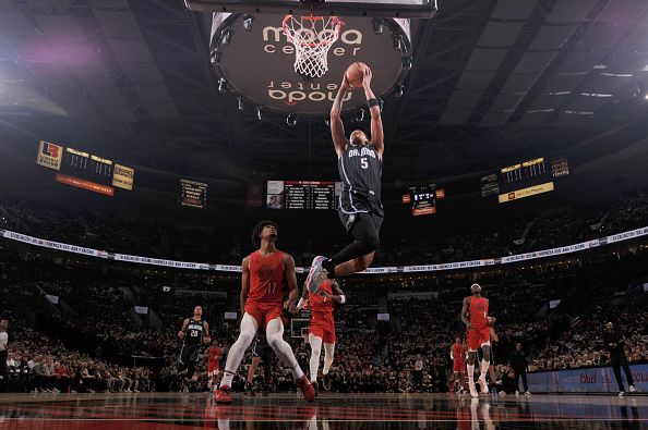 PORTLAND, OR - OCTOBER 27: Paolo Banchero #5 of the Orlando Magic dunks the ball during the game against the Portland Trail Blazers on October 27, 2023 at the Moda Center Arena in Portland, Oregon. NOTE TO USER: User expressly acknowledges and agrees that, by downloading and or using this photograph, user is consenting to the terms and conditions of the Getty Images License Agreement. Mandatory Copyright Notice: Copyright 2023 NBAE (Photo by Cameron Browne/NBAE via Getty Images)