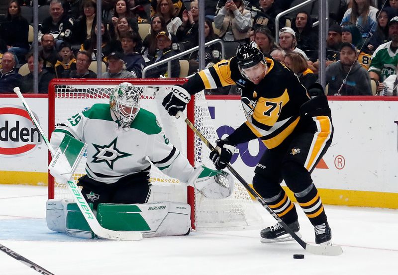 Oct 24, 2023; Pittsburgh, Pennsylvania, USA; Dallas Stars defenseman Jerad Rosburg (39) defends Pittsburgh Penguins center Evgeni Malkin (71) during the third period  at PPG Paints Arena. Dallas won 4-1. Mandatory Credit: Charles LeClaire-USA TODAY Sports