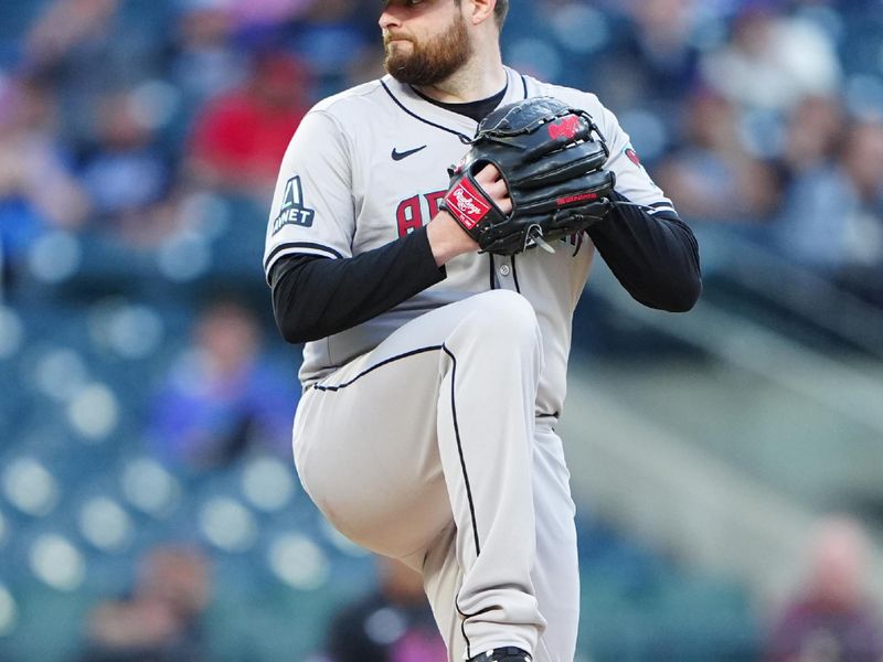 May 31, 2024; New York City, New York, USA; Arizona Diamondbacks pitcher Jordan Montgomery (52) delivers a pitch against the New York Mets during the first inning at Citi Field. Mandatory Credit: Gregory Fisher-USA TODAY Sports