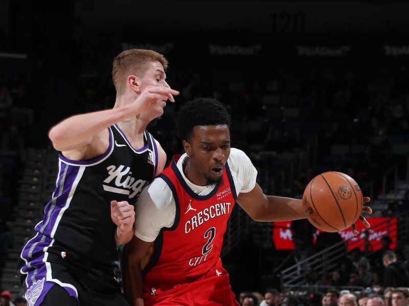 NEW ORLEANS, LA - DECEMBER 12: Herbert Jones #2 of the New Orleans Pelicans dribbles the ball during the game against the Sacramento Kings on December 12, 2024 at the Smoothie King Center in New Orleans, Louisiana. NOTE TO USER: User expressly acknowledges and agrees that, by downloading and or using this Photograph, user is consenting to the terms and conditions of the Getty Images License Agreement. Mandatory Copyright Notice: Copyright 2024 NBAE (Photo by Layne Murdoch Jr./NBAE via Getty Images)