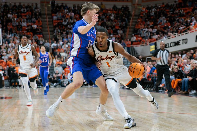 Jan 16, 2024; Stillwater, Oklahoma, USA; Oklahoma State Cowboys guard Bryce Thompson (1) attempts to drive past Kansas Jayhawks guard Johnny Furphy (10) during the first half at Gallagher-Iba Arena. Mandatory Credit: William Purnell-USA TODAY Sports