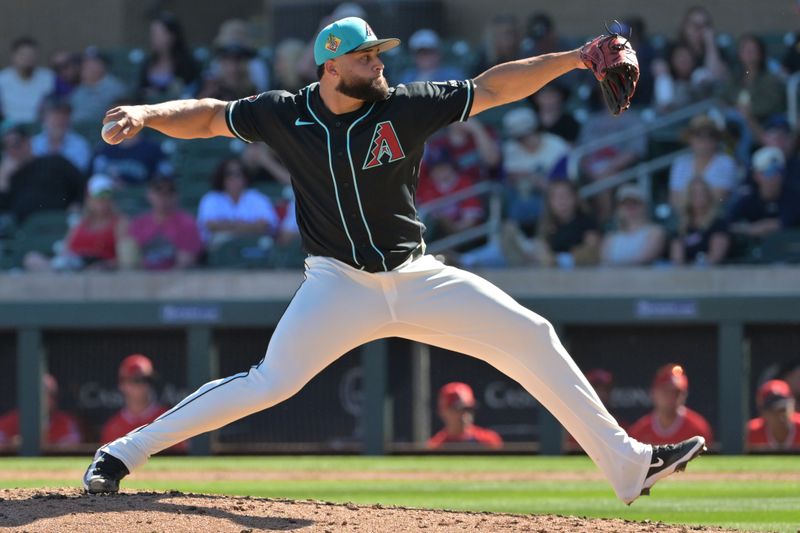 Feb 22, 2026; Salt River Pima-Maricopa, Arizona, USA; Arizona Diamondbacks pitcher Junior Fernández (53) delivers to the plate in the fifth inning against the Los Angeles Angels at Salt River Fields at Talking Stick. Mandatory Credit: Jayne Kamin-Oncea-Imagn Images
