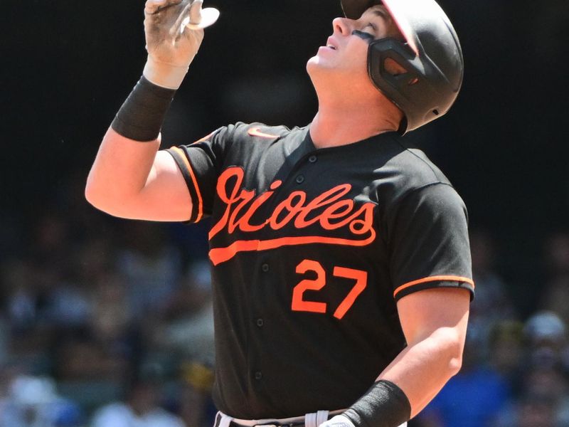 Jun 8, 2023; Milwaukee, Wisconsin, USA; Baltimore Orioles catcher James McCann (27) reacts after hitting a double against the Baltimore Orioles in the fifth inning at American Family Field. Mandatory Credit: Benny Sieu-USA TODAY Sports