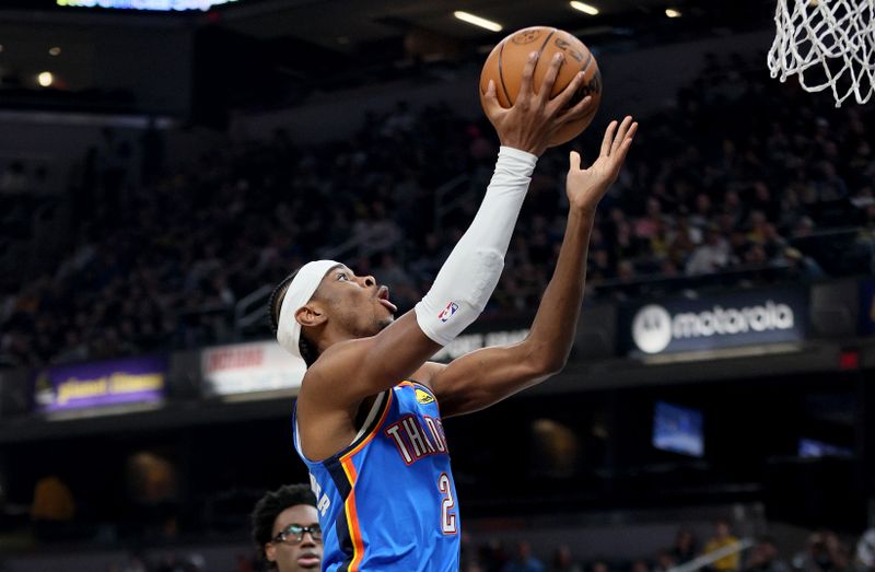 INDIANAPOLIS, INDIANA - MARCH 31:  Shai Gilgeous-Alexander #2 of the Oklahoma City Thunder against Indiana Pacers at Gainbridge Fieldhouse on March 31, 2023 in Indianapolis, Indiana.    NOTE TO USER: User expressly acknowledges and agrees that, by downloading and/or using this photograph, User is consenting to the terms and conditions of the Getty Images License Agreement. (Photo by Andy Lyons/Getty Images)