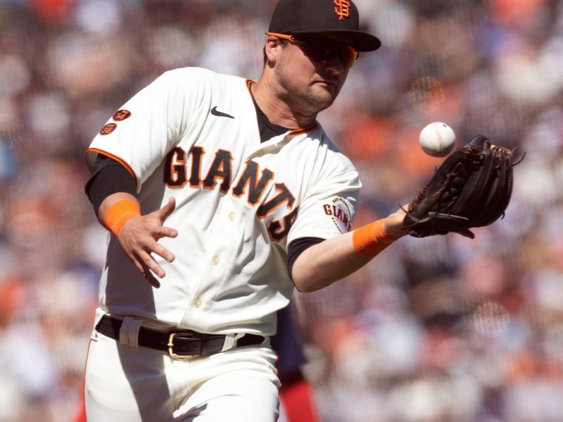 Jul 30, 2023; San Francisco, California, USA; San Francisco Giants third baseman J.D. Davis (7) makes a running catch in foul ground of a popup by Boston Red Sox right fielder Alex Verdugo during the ninth inning at Oracle Park. Mandatory Credit: D. Ross Cameron-USA TODAY Sports