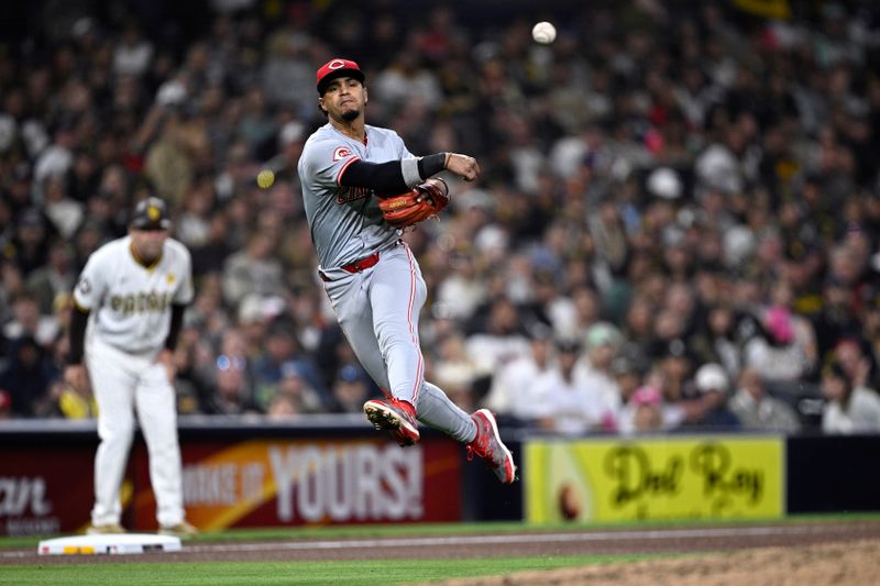 Apr 29, 2024; San Diego, California, USA; Cincinnati Reds third baseman Santiago Espinal (4) throws to first base on a ground out by San Diego Padres third baseman Manny Machado (not pictured) during the seventh inning at Petco Park. Mandatory Credit: Orlando Ramirez-USA TODAY Sports