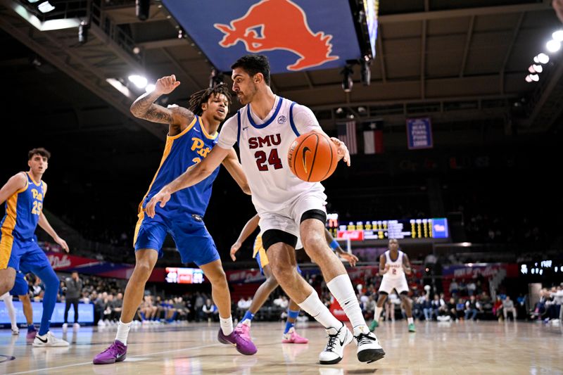 Feb 11, 2025; Dallas, Texas, USA; Southern Methodist Mustangs center Samet Yigitoglu (24) moves to the basket past Pittsburgh Panthers forward Cameron Corhen (2) during the second half at Moody Coliseum. Mandatory Credit: Jerome Miron-Imagn Images