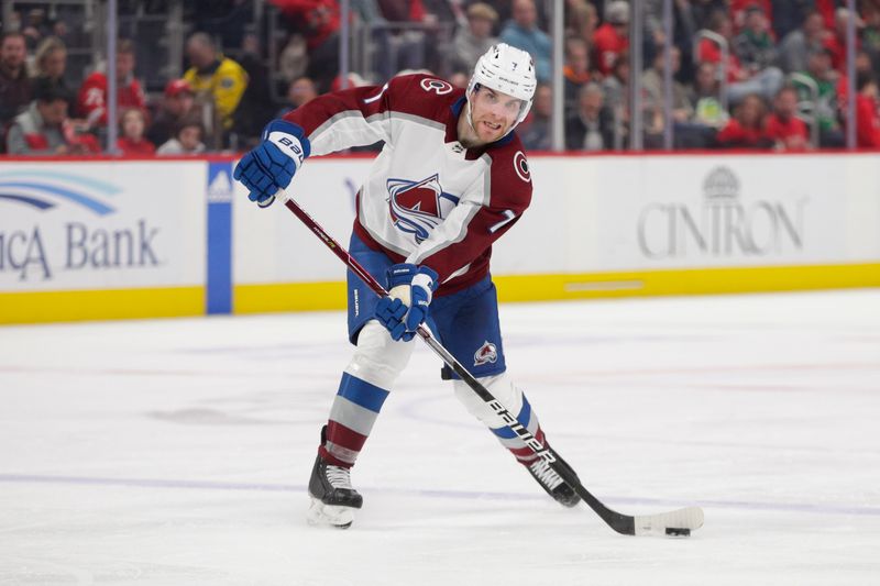 Mar 18, 2023; Detroit, Michigan, USA; Colorado Avalanche defenseman Devon Toews (7) handles the puck against the Detroit Red Wings during the third period at Little Caesars Arena. Mandatory Credit: Brian Bradshaw Sevald-USA TODAY Sports