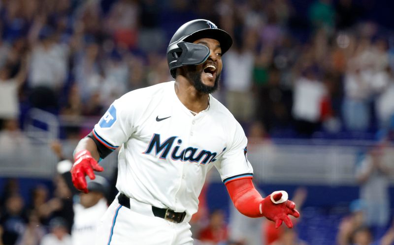 Jun 18, 2024; Miami, Florida, USA;  Miami Marlins shortstop Vidal Brujan (17) gets doused reacts after singling in the winning run against the St. Louis Cardinals  after the tenth inning at loanDepot Park. Mandatory Credit: Rhona Wise-USA TODAY Sports