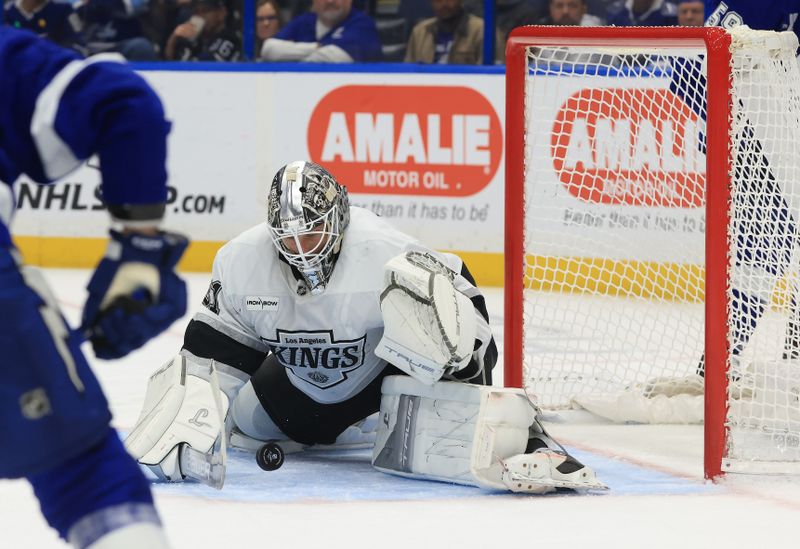 Dec 18, 2025; Tampa, Florida, USA; Los Angeles Kings goaltender Anton Forsberg (31) makes a save against the Tampa Bay Lightning during the third period at Benchmark International Arena. Mandatory Credit: Kim Klement Neitzel-Imagn Images
