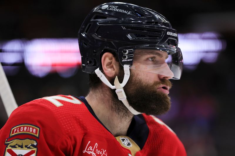 Feb 6, 2024; Sunrise, Florida, USA; Florida Panthers left wing Jonah Gadjovich (12) looks on against the Philadelphia Flyers during the second period at Amerant Bank Arena. Mandatory Credit: Sam Navarro-USA TODAY Sports