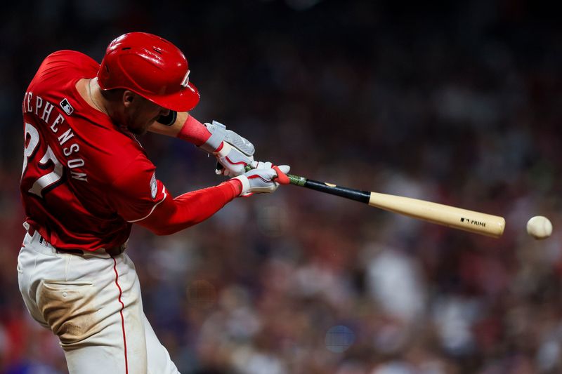 May 25, 2024; Cincinnati, Ohio, USA; Cincinnati Reds catcher Tyler Stephenson (37) hits a single against the Los Angeles Dodgers in the seventh inning at Great American Ball Park. Mandatory Credit: Katie Stratman-USA TODAY Sports