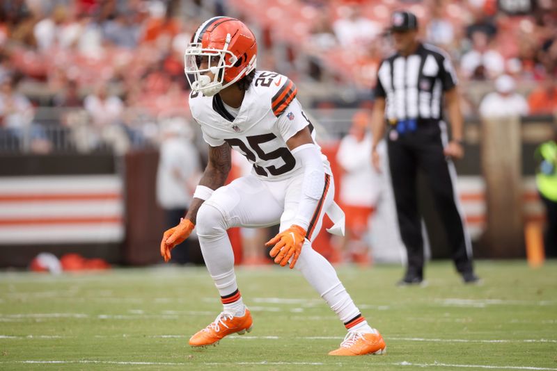 Cleveland Browns cornerback Kahlef Hailassie (25) drops back in coverage during a preseason NFL football game against the Green Bay Packers, Saturday, Aug. 10, 2024, in Cleveland. (AP Photo/Kirk Irwin)