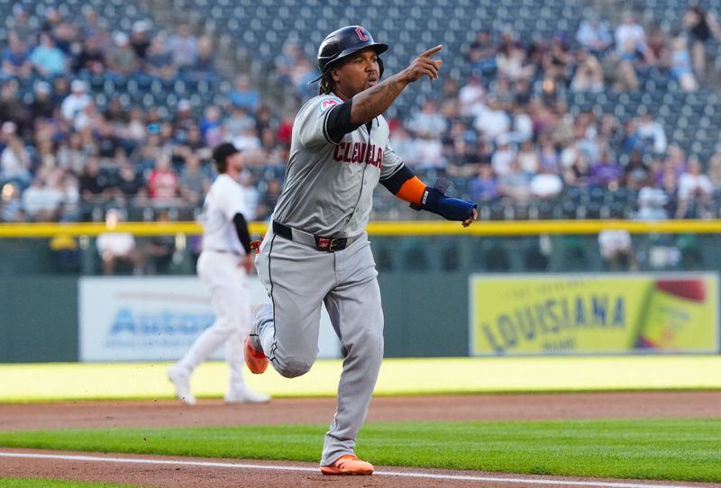 May 29, 2024; Denver, Colorado, USA; Cleveland Guardians third base Jose Ramirez (11) reacts before scoring a run in the first inning against the Colorado Rockies at Coors Field. Mandatory Credit: Ron Chenoy-USA TODAY Sports