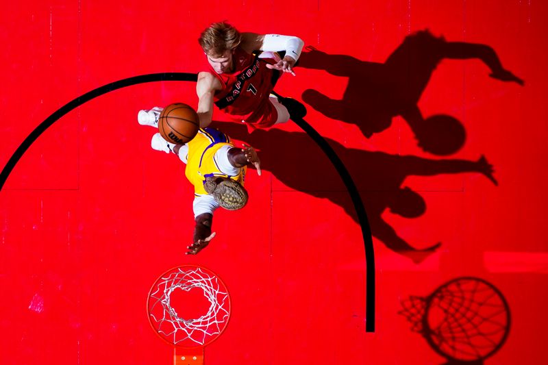 TORONTO, CANADA - NOVEMBER 1: Gradey Dick #1 of the Toronto Raptors drives to the basket during the game against the Los Angeles Lakers on November 1, 2024 at the Scotiabank Arena in Toronto, Ontario, Canada.  NOTE TO USER: User expressly acknowledges and agrees that, by downloading and or using this Photograph, user is consenting to the terms and conditions of the Getty Images License Agreement.  Mandatory Copyright Notice: Copyright 2024 NBAE (Photo by Mark Blinch/NBAE via Getty Images)