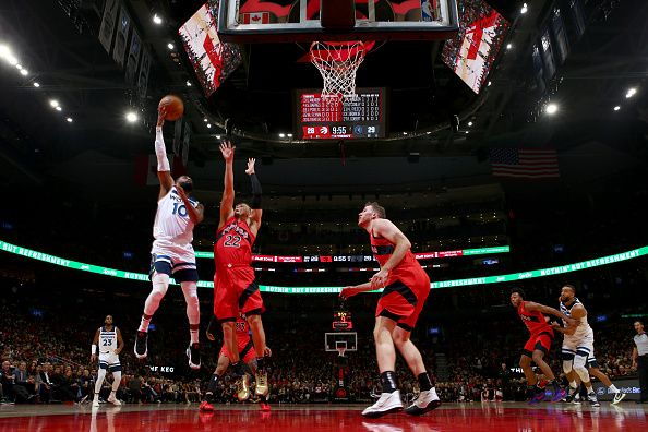 TORONTO, CANADA - OCTOBER 25: Mike Conley #10 of the Minnesota Timberwolves shoots the ball during the game against the Toronto Raptors on October 25, 2023 at the Scotiabank Arena in Toronto, Ontario, Canada.  NOTE TO USER: User expressly acknowledges and agrees that, by downloading and or using this Photograph, user is consenting to the terms and conditions of the Getty Images License Agreement.  Mandatory Copyright Notice: Copyright 2023 NBAE (Photo by Vaughn Ridley/NBAE via Getty Images)