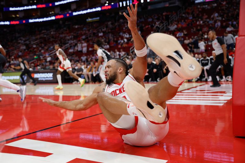 HOUSTON, TEXAS - NOVEMBER 06: Dillon Brooks #9 of the Houston Rockets reacts in the first half against the San Antonio Spurs at Toyota Center on November 06, 2024 in Houston, Texas.  NOTE TO USER: User expressly acknowledges and agrees that, by downloading and or using this photograph, User is consenting to the terms and conditions of the Getty Images License Agreement.  (Photo by Tim Warner/Getty Images)