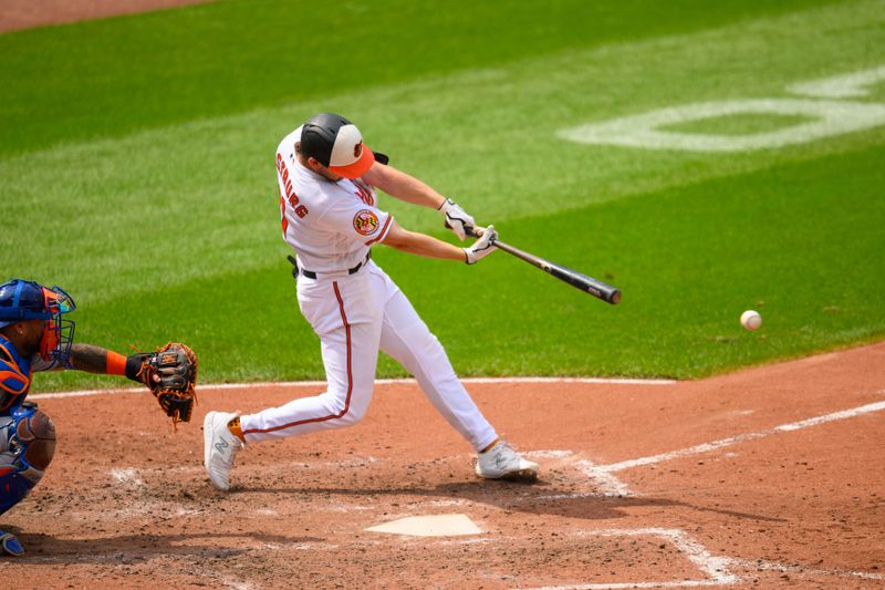 Aug 6, 2023; Baltimore, Maryland, USA; Baltimore Orioles second baseman Jordan Westburg (11) hits a single during the sixth inning against the New York Mets at Oriole Park at Camden Yards. Mandatory Credit: Reggie Hildred-USA TODAY Sports