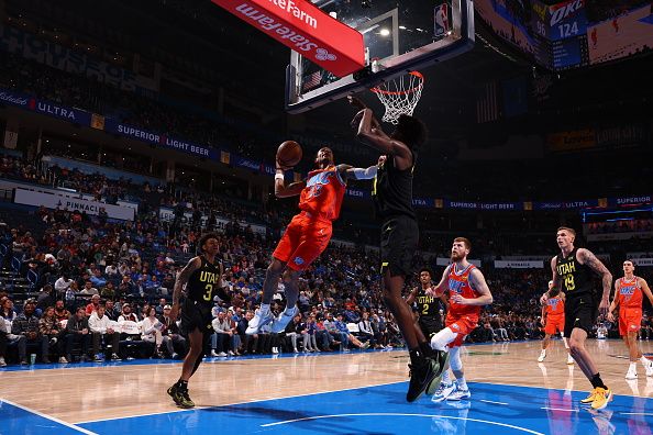 OKLAHOMA CITY, OK - DECEMBER 11: Tre Mann #23 of the Oklahoma City Thunder drives to the basket during the game against the Utah Jazz on December 11, 2023 at Paycom Arena in Oklahoma City, Oklahoma. NOTE TO USER: User expressly acknowledges and agrees that, by downloading and or using this photograph, User is consenting to the terms and conditions of the Getty Images License Agreement. Mandatory Copyright Notice: Copyright 2023 NBAE (Photo by Zach Beeker/NBAE via Getty Images)