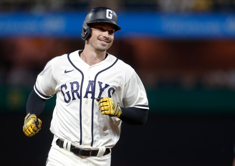 Aug 13, 2023; Pittsburgh, PA, USA; Pittsburgh Pirates left fielder Bryan Reynolds (10) circles the bases on his second solo home run of the game against the Cincinnati Reds during the seventh inning at PNC Park. Mandatory Credit: Charles LeClaire-USA TODAY Sports