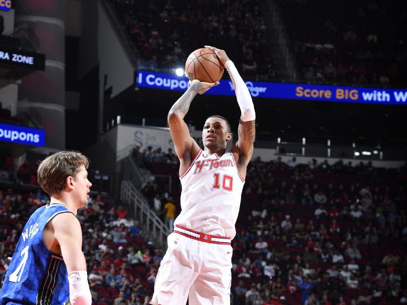 HOUSTON, TX - APRIL 9: Jabari Smith Jr. #10 of the Houston Rockets shoots the ball during the game against the Orlando Magic on April 9, 2024 at the Toyota Center in Houston, Texas. NOTE TO USER: User expressly acknowledges and agrees that, by downloading and or using this photograph, User is consenting to the terms and conditions of the Getty Images License Agreement. Mandatory Copyright Notice: Copyright 2024 NBAE (Photo by Logan Riely/NBAE via Getty Images)