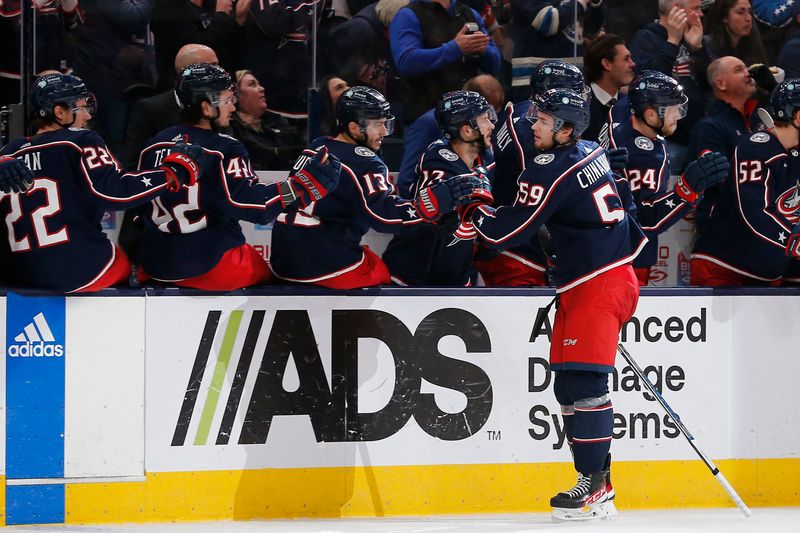 Dec 8, 2023; Columbus, Ohio, USA; Columbus Blue Jackets right wing Yegor Chinakhov (59) celebrates his goal against the St. Louis Blues during the third period at Nationwide Arena. Mandatory Credit: Russell LaBounty-USA TODAY Sports